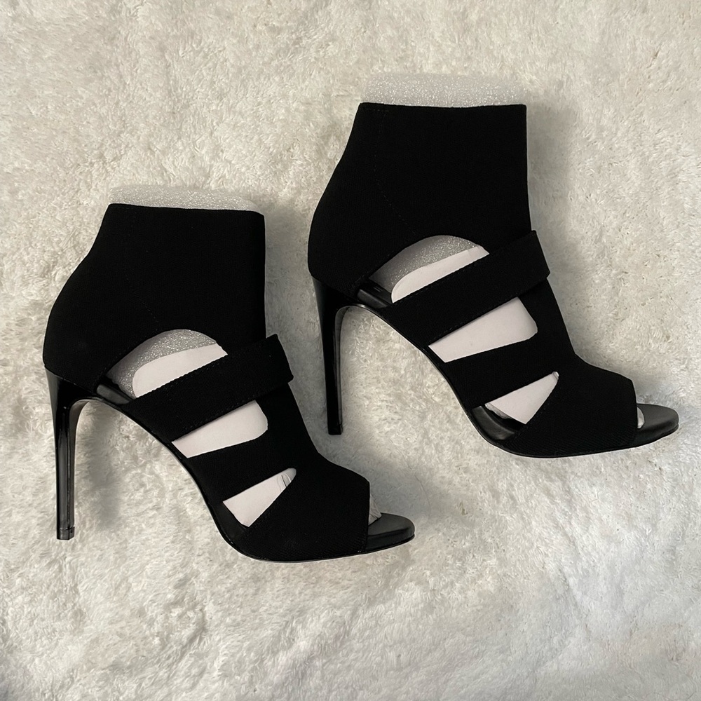 Black stretch fabric open toe heels
